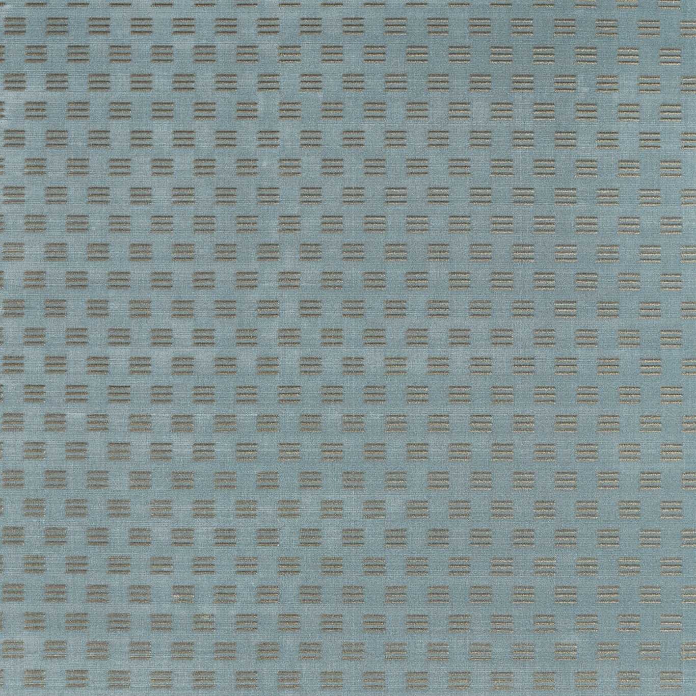 a blue rug with small squares on it