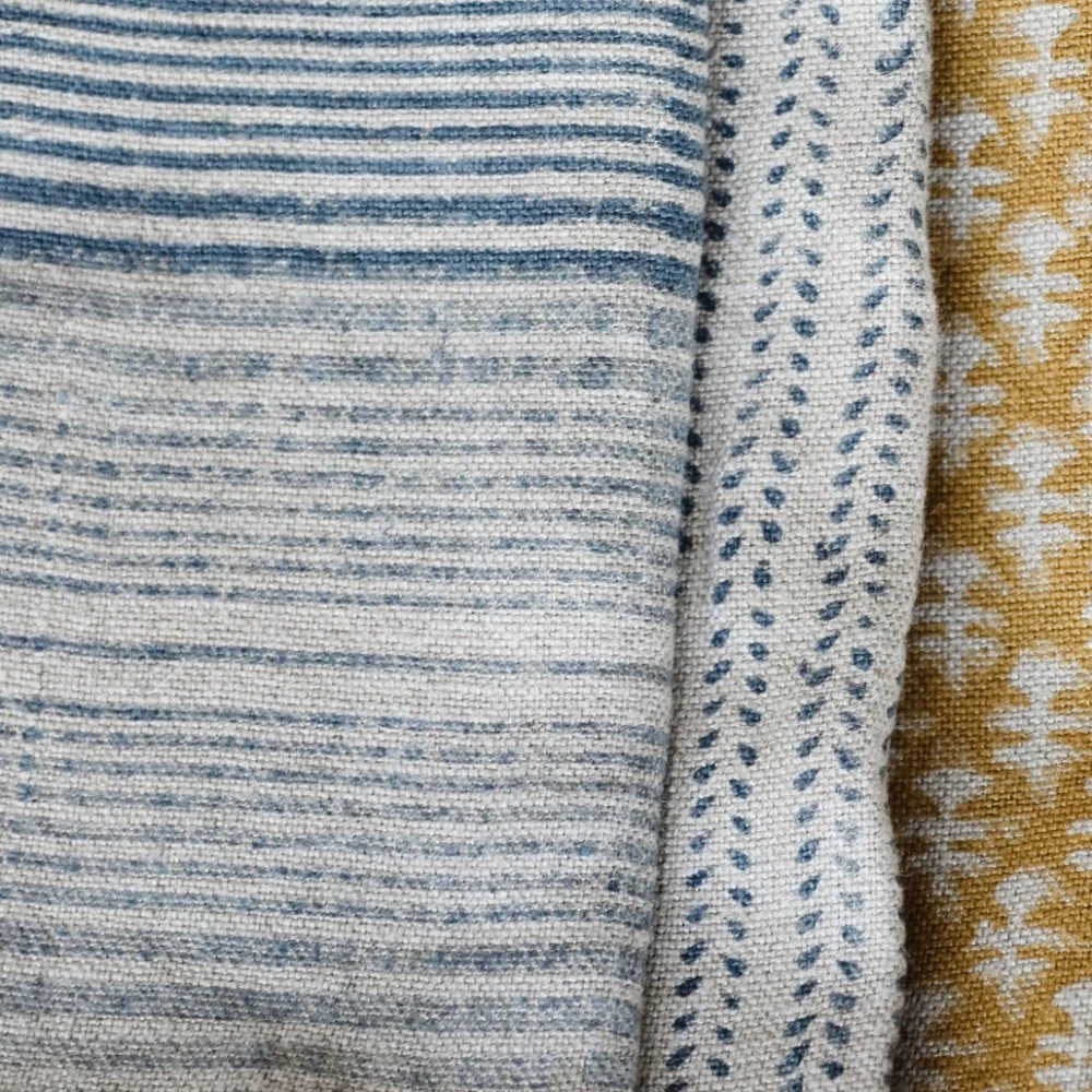 a close up of two different colored sweaters