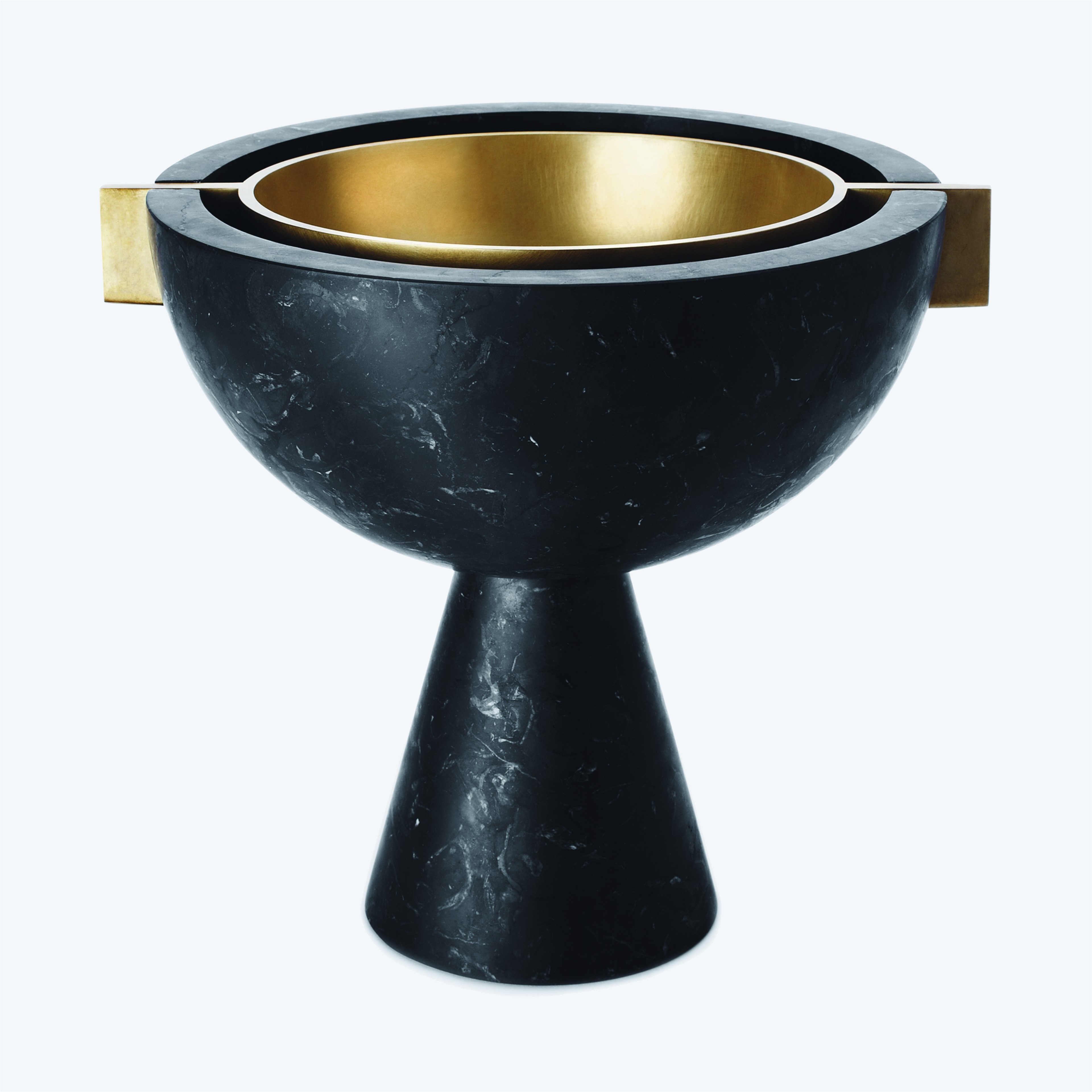a black and gold bowl on a white background