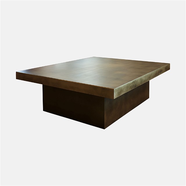a square wooden table with a metal base