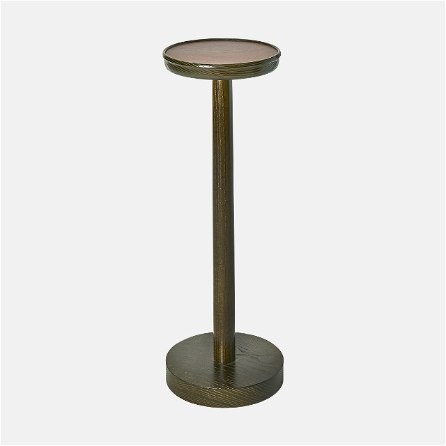 a round metal table with a wooden base