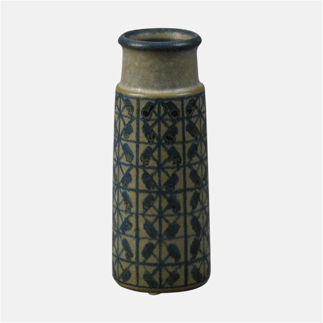 a ceramic vase with a design on it