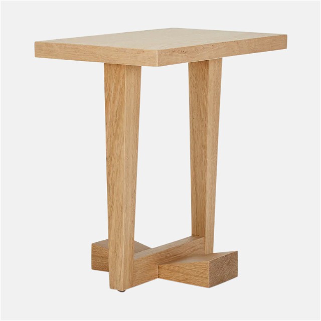 a small wooden table with a square top
