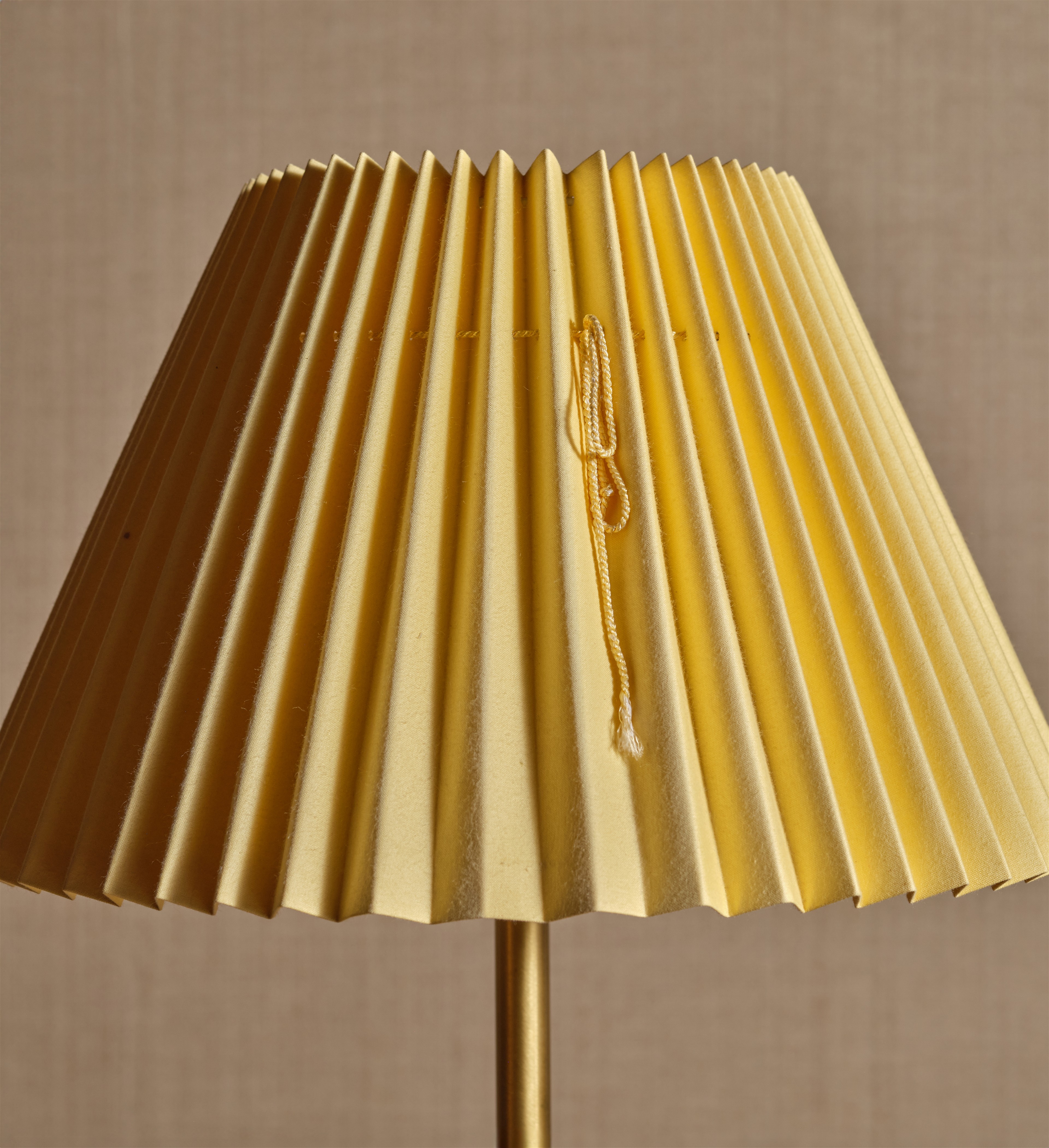 a close up of a lamp on a table