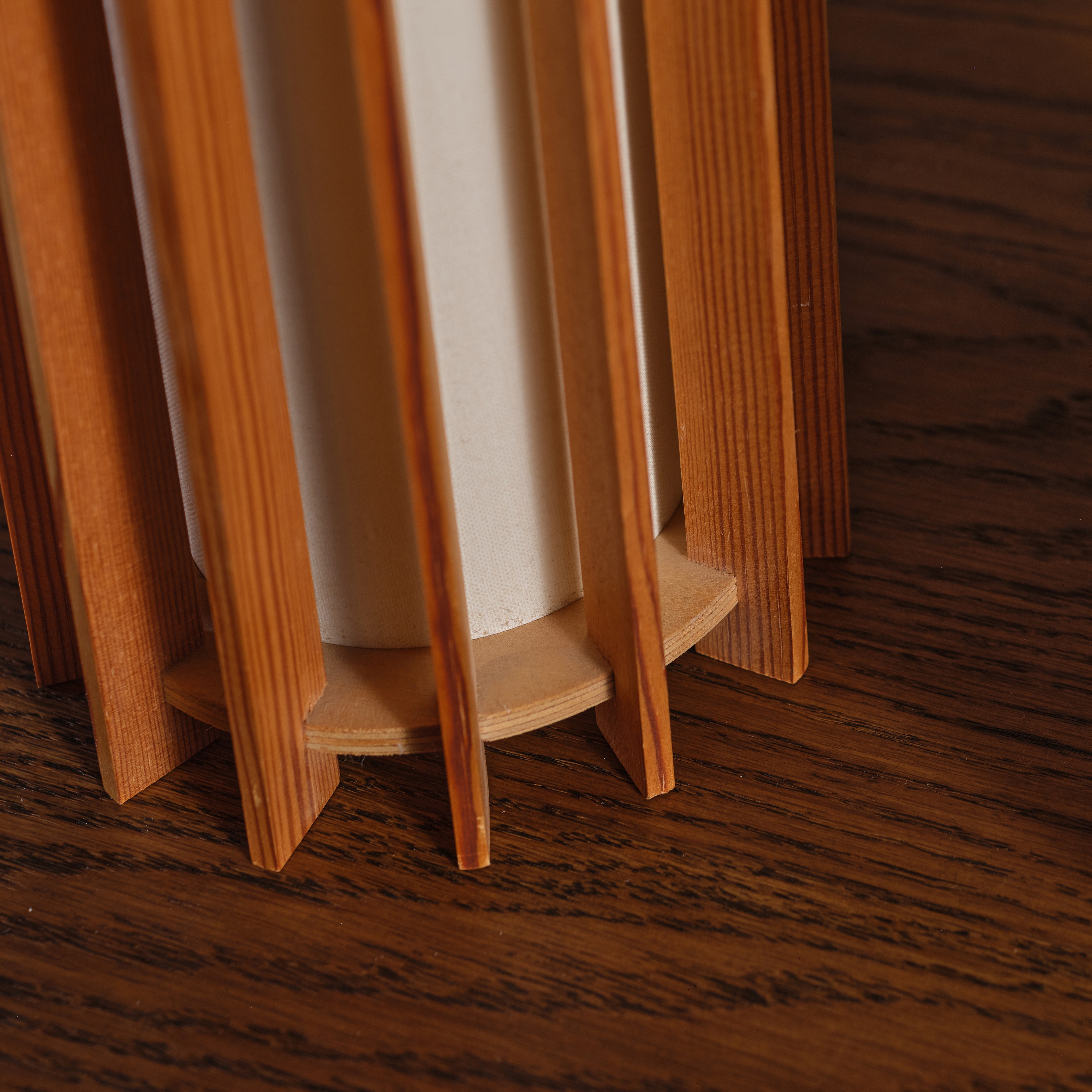 a close up of a wooden pole on a wooden floor