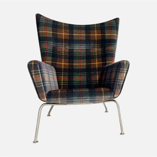a chair with a plaid pattern on it