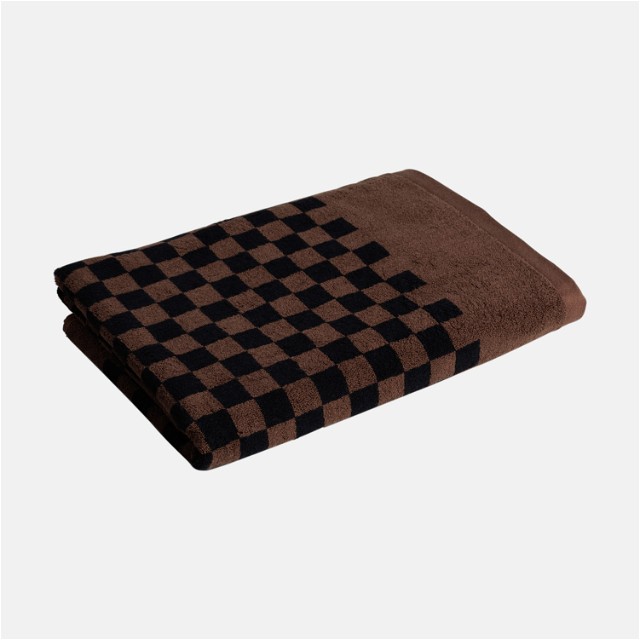 a brown and black checkered towel on a white background