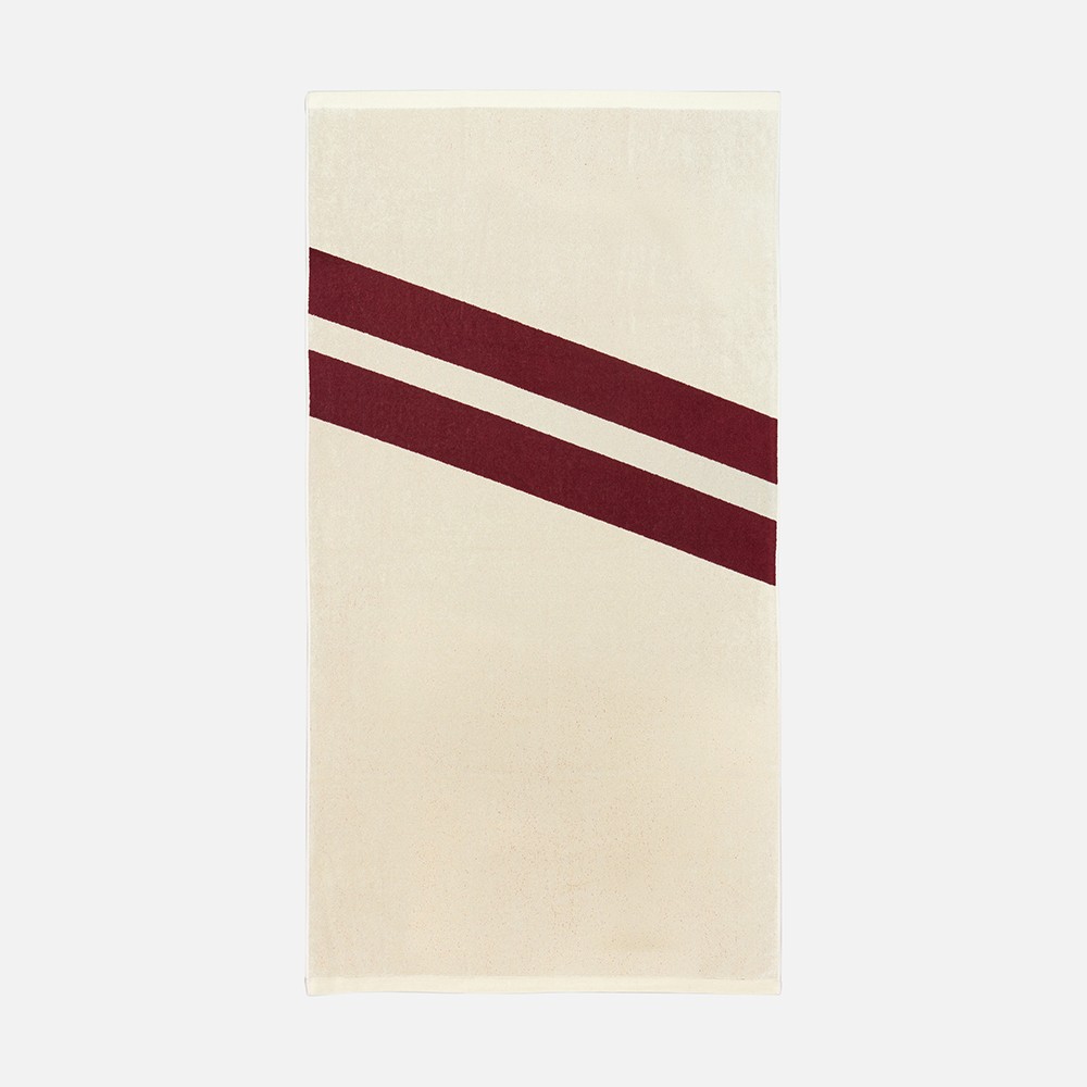 a white towel with a red stripe on it