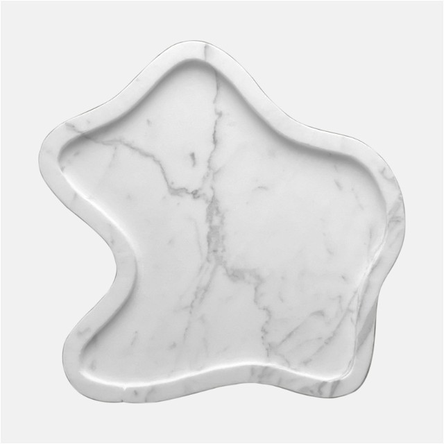 a white marble plate with a white background