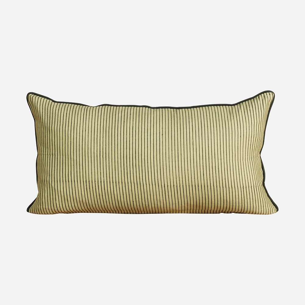 a striped pillow on a white background
