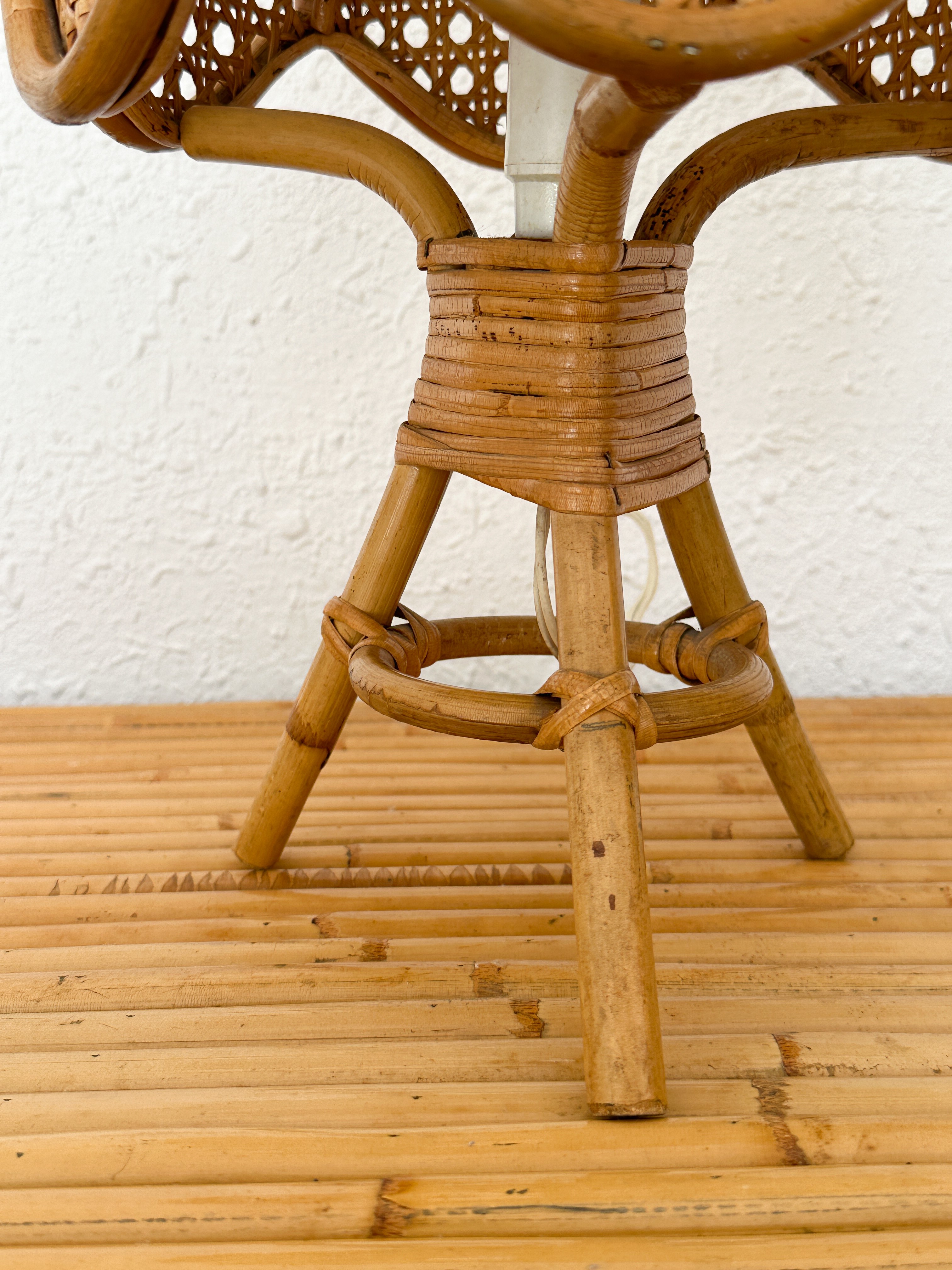 a wooden stool with a white top and a wooden floor