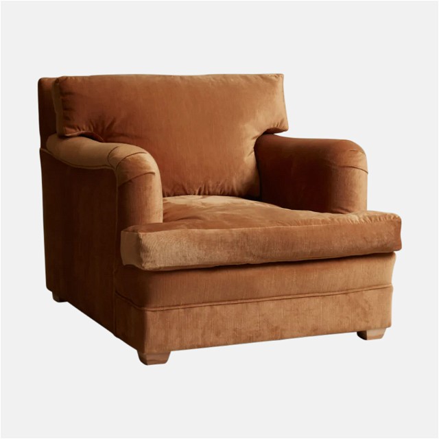 a brown chair with a pillow on top of it