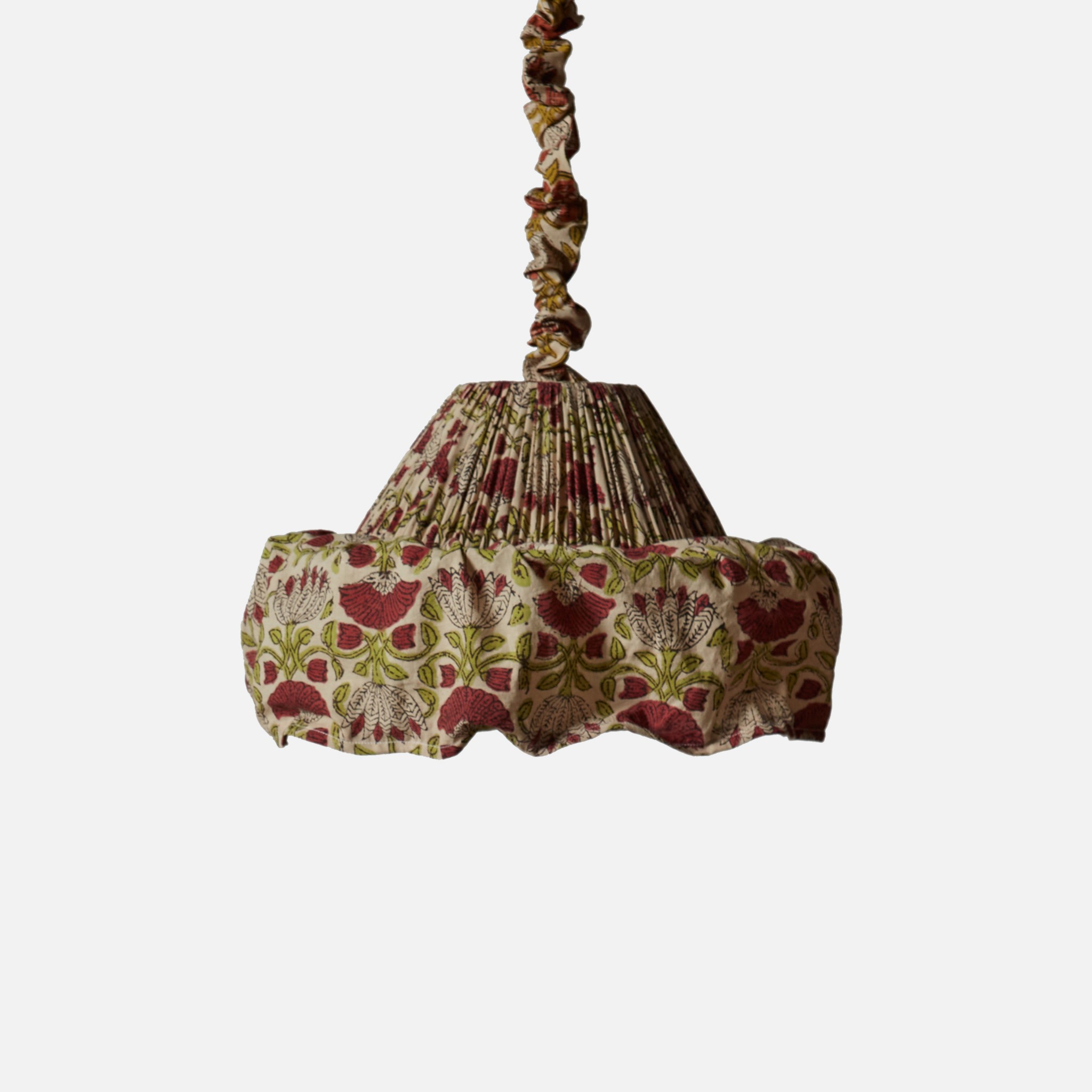 a lamp shade with a flower pattern on it
