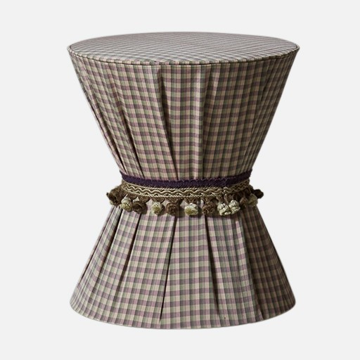 a brown and white checkered lamp shade on a white background