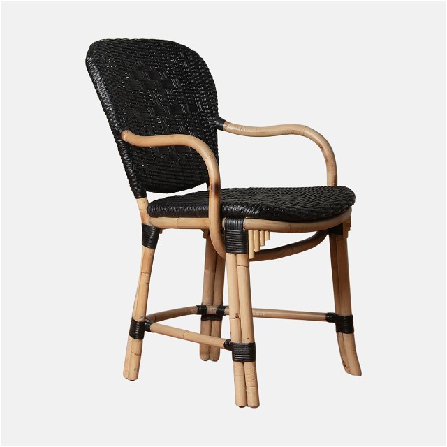 a wooden chair with a black seat