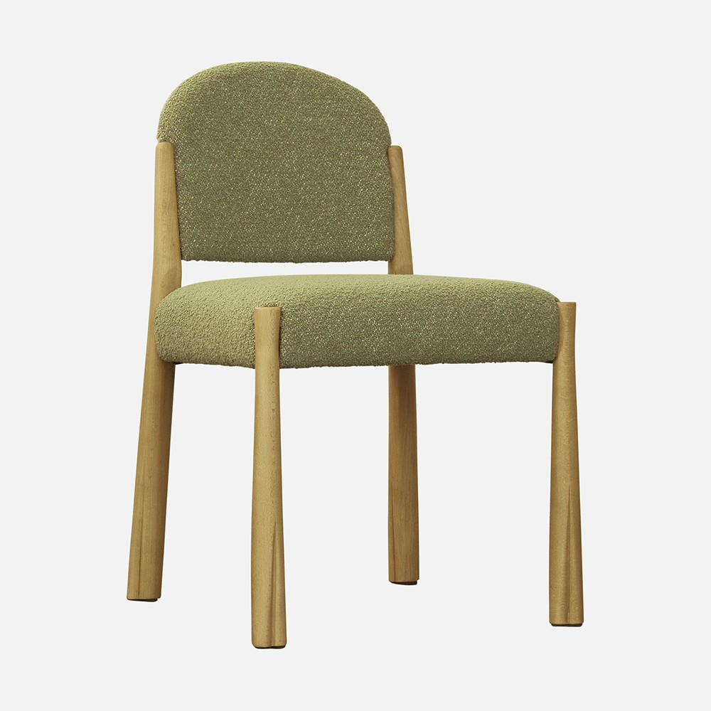 a wooden chair with a green upholstered seat