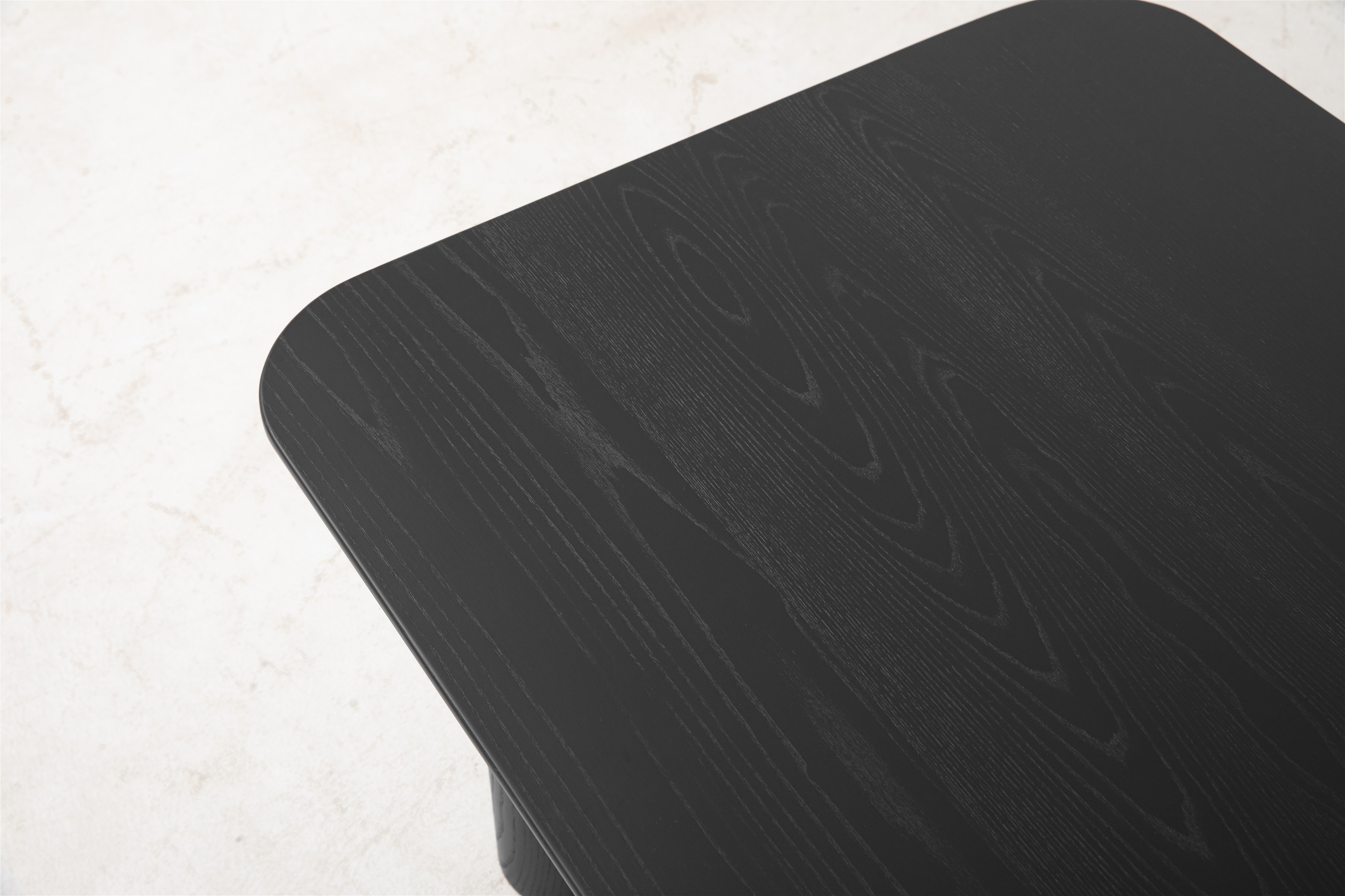 a close up of a black table with a white background