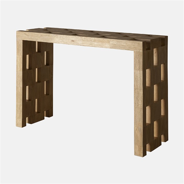a wooden table with a geometric design on it