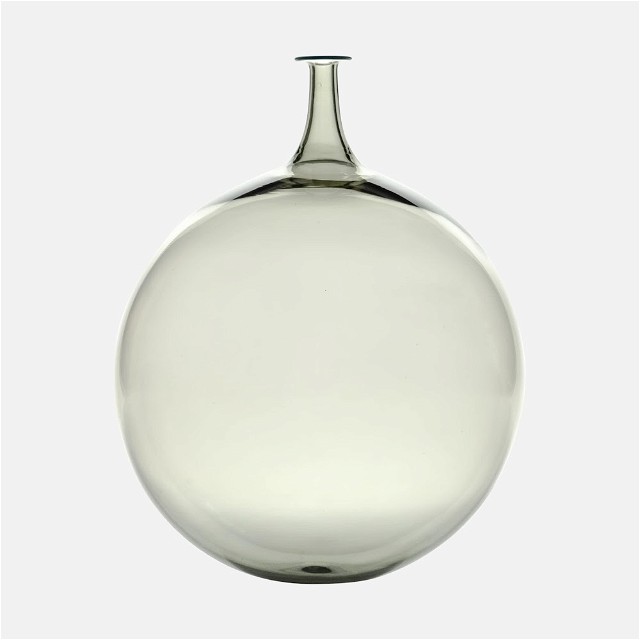 a glass vase with a white background