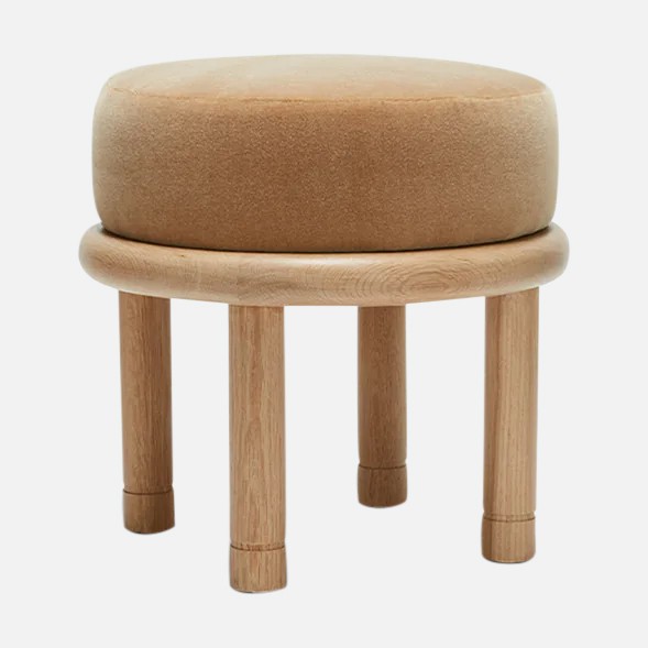 a wooden stool with a round seat on it