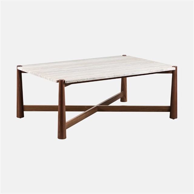 a table with a marble top and wooden legs