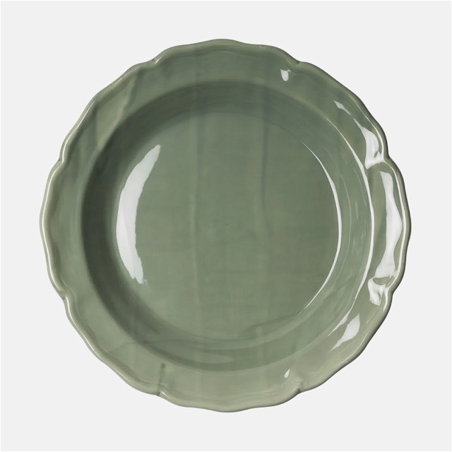 a green plate on a white background