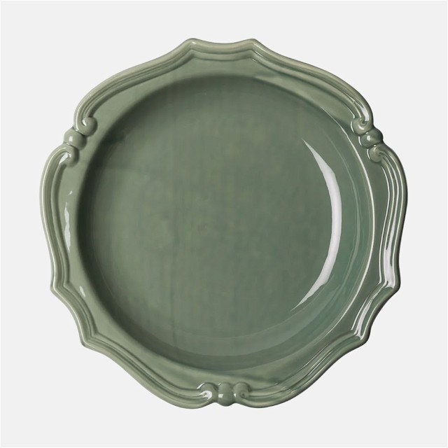 a green plate on a white background
