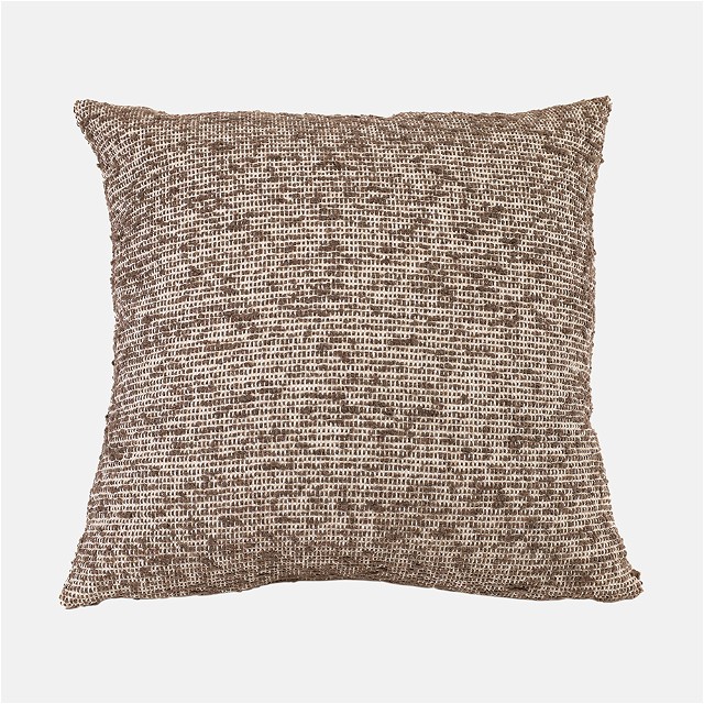 a brown and white pillow on a white background