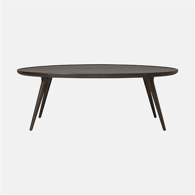 a black table with wooden legs and a black top