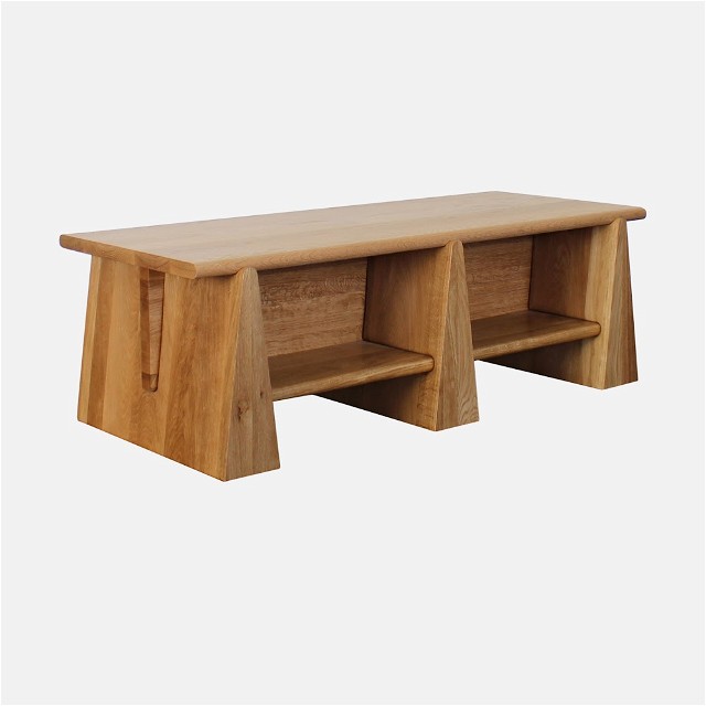 a wooden table with two shelves on top of it