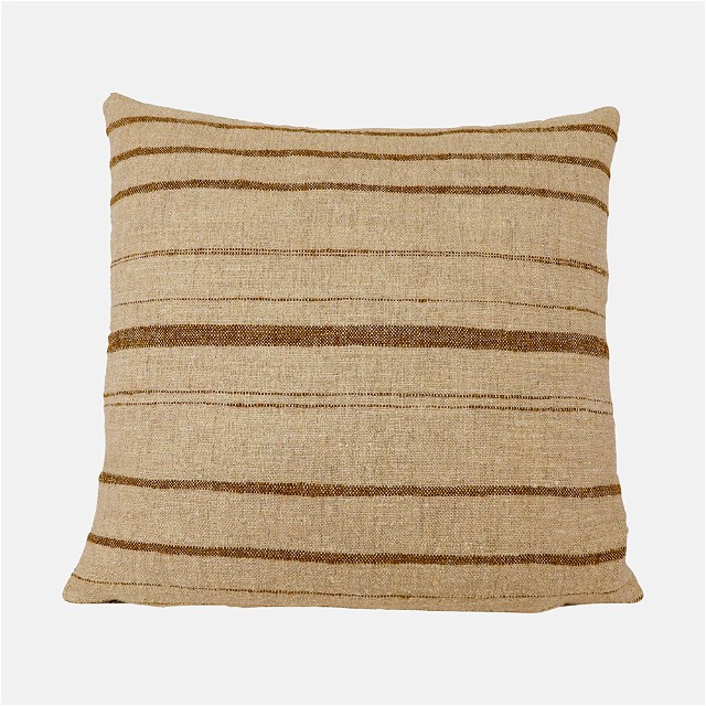 a beige and brown striped pillow on a white background