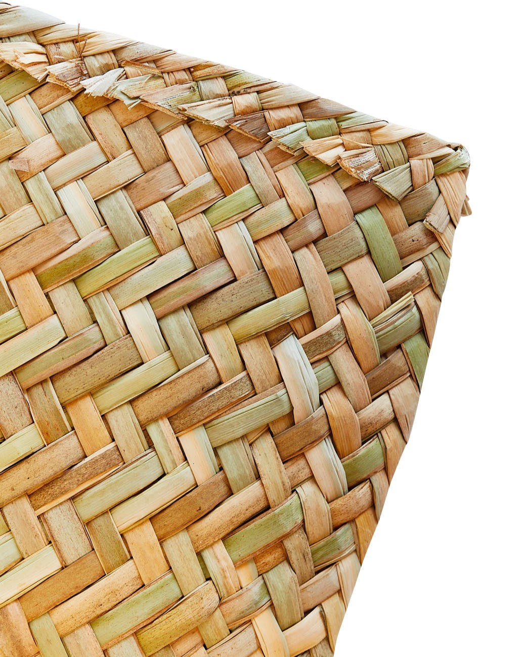 a close up of a woven basket on a white background