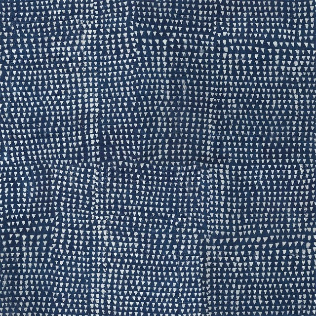 a blue and white background with small white dots