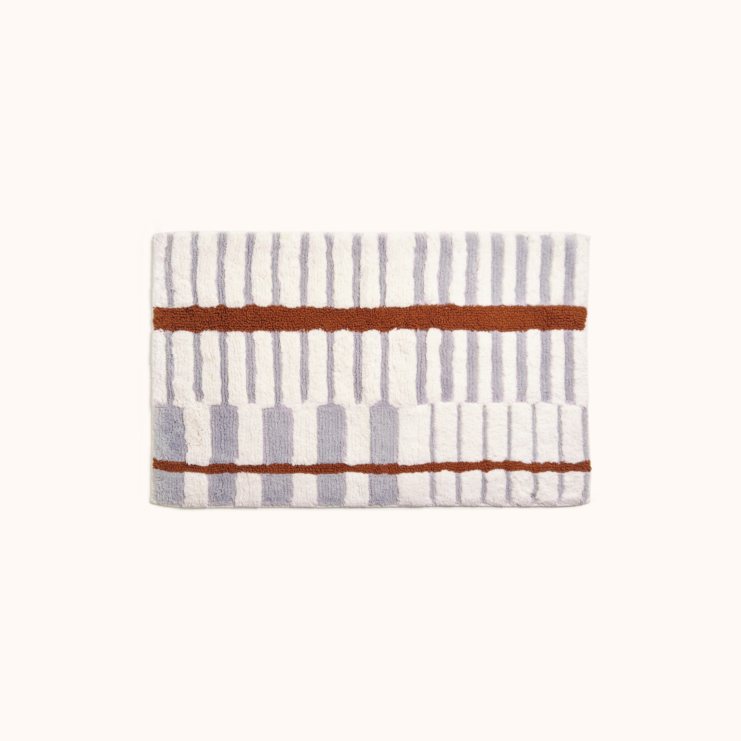 a white towel with a brown stripe on it
