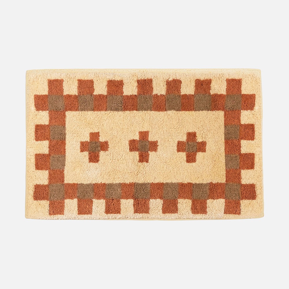a brown and white rug on a white background