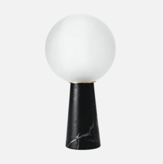 a black and white lamp on a white background