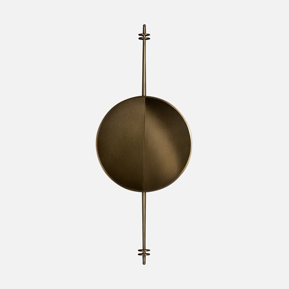 a round metal object with two poles attached to it
