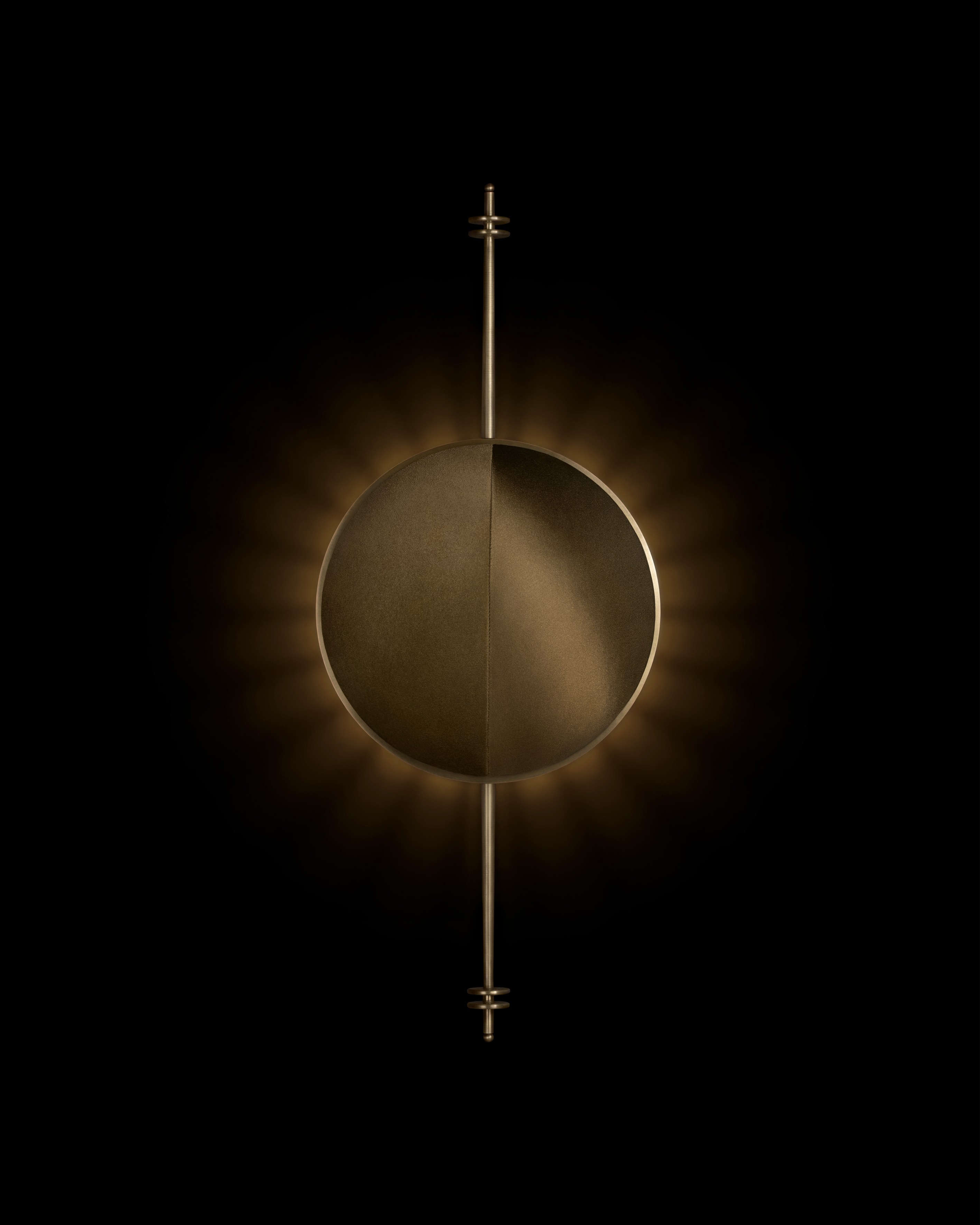 a black and gold clock with a black background