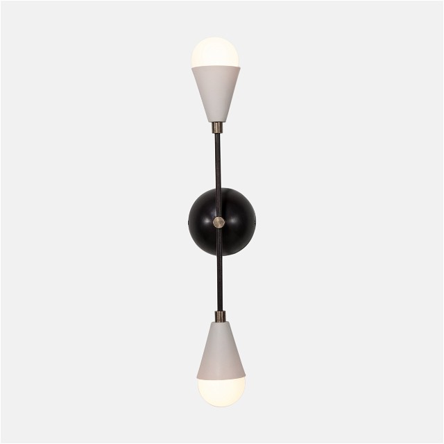 a black and white light fixture on a white wall