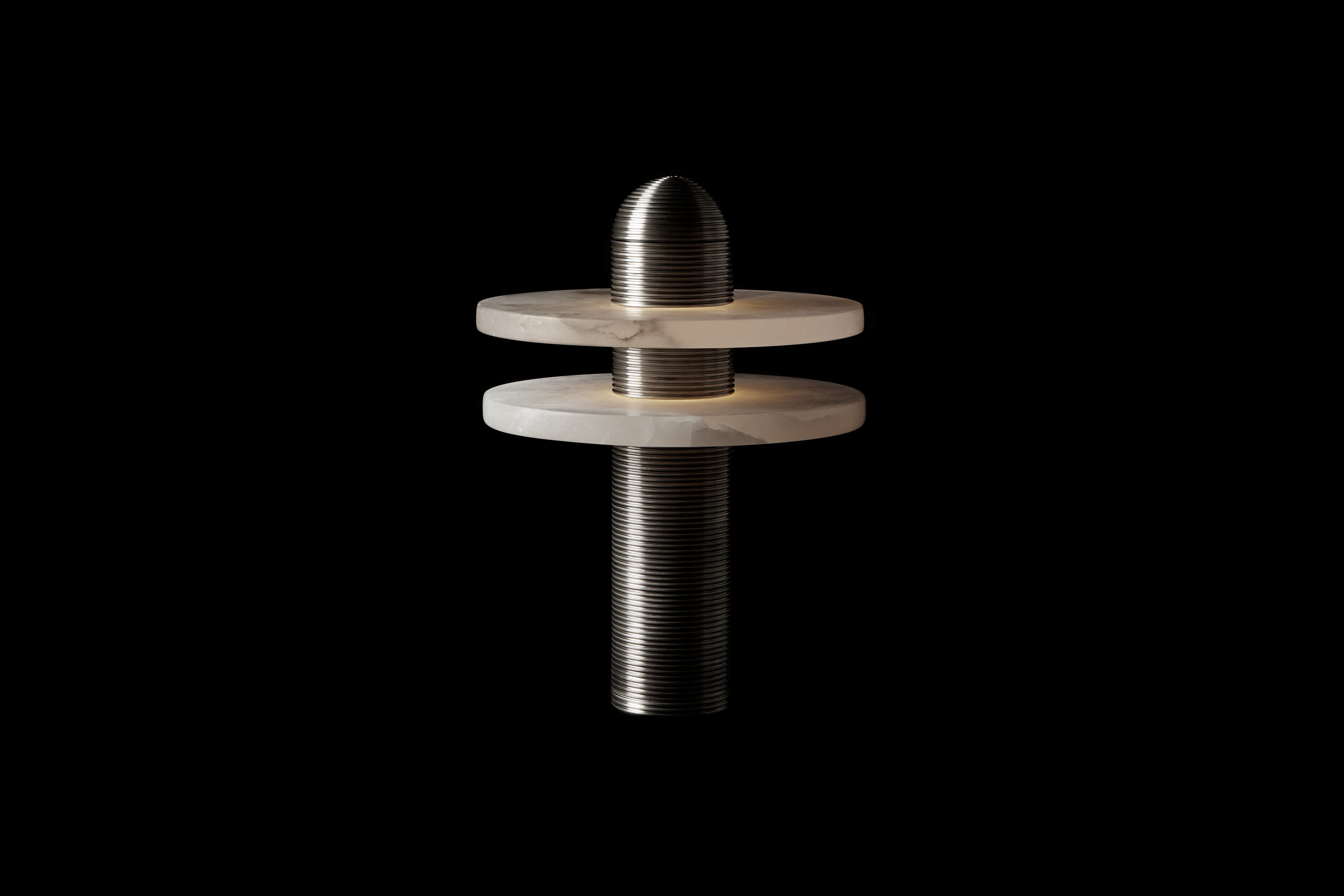 a metal object on a black background