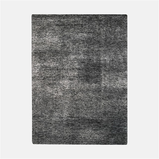 a black and white rug on a white background