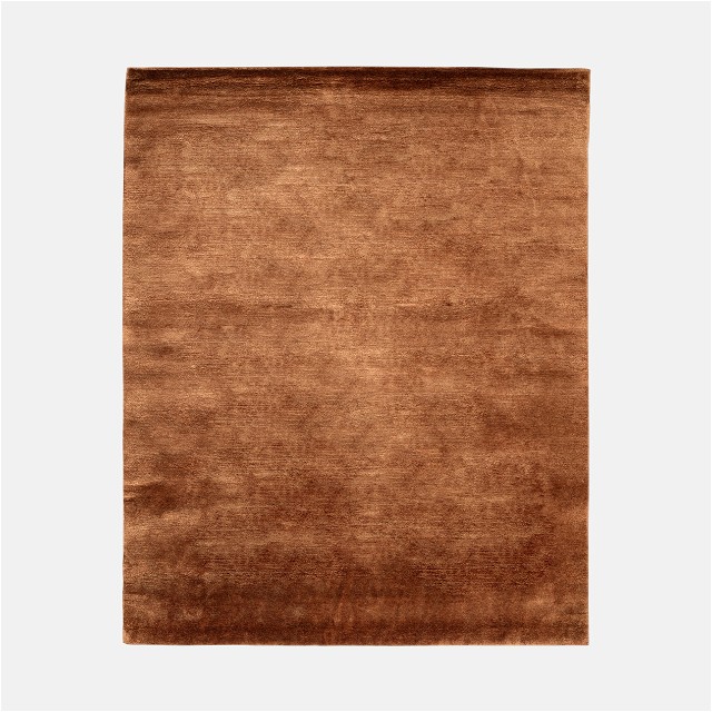 a brown rug on a white background