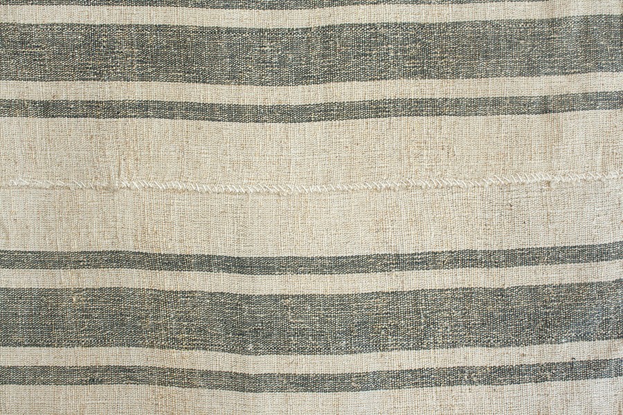 a close up of a black and white striped rug