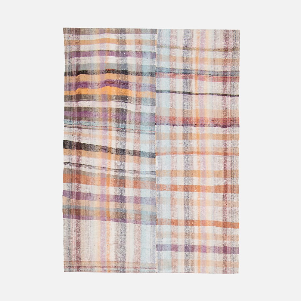 a multicolored plaid scarf on a white background