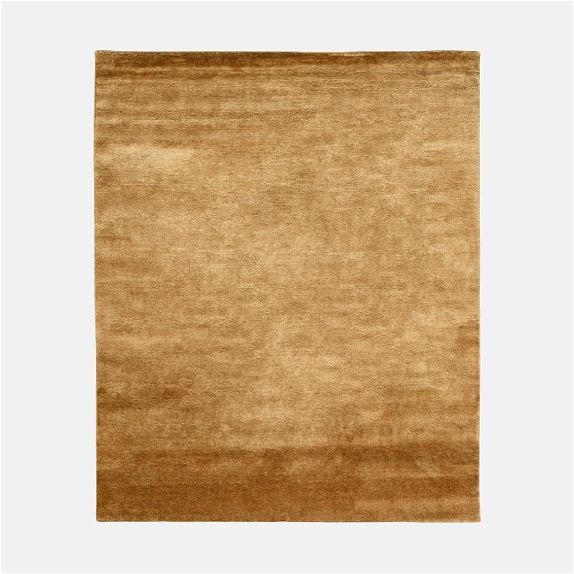 a brown rug with a white background